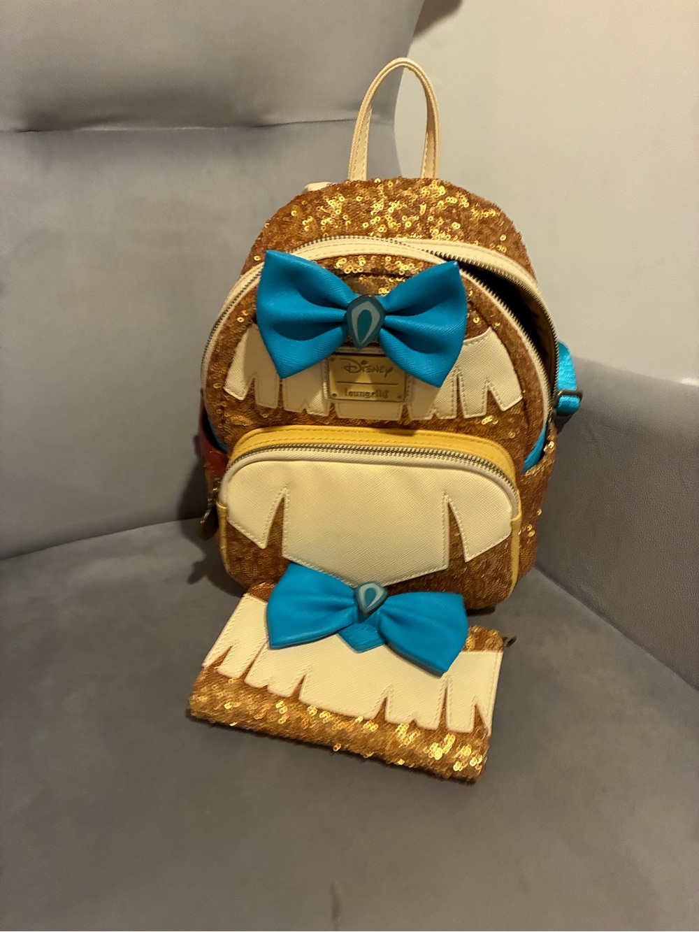 Pocahontas Inspired Loungefly Gold Sequin Mini Backpack with Teal Bow Accents - Picture 1 of 5